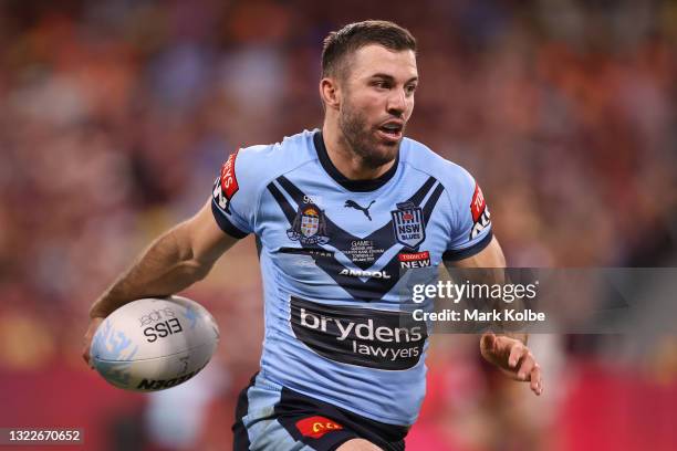 James Tedesco of the Blues makes a break during game one of the 2021 State of Origin series between the New South Wales Blues and the Queensland...