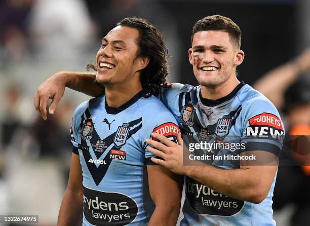 Nathan Cleary and Jarome Luai of the Blues celebrate after winning game one of the 2021 State of Origin series between the New South Wales Blues and...