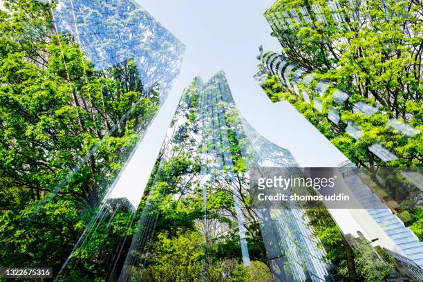 abstract of city skyscrapers and trees - future banking stock pictures, royalty-free photos & images