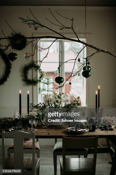 christmas decorations and set table - rustic decor stock pictures, royalty-free photos & images