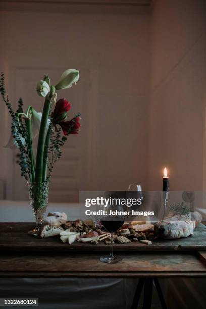 cheese and bread on table - amaryllis family stock pictures, royalty-free photos & images
