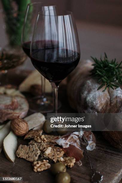 red wine in wineglass - johner images bildbanksfoton och bilder