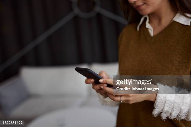 businesswoman using cell phone - johner images bildbanksfoton och bilder