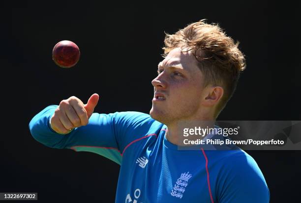Dom Bess of England tosses the ball during a training session before the second LV= Test between England and New Zealand at Edgbaston on June 09,...
