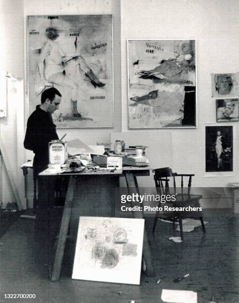 American Pop artist and musician Larry Rivers at work in his Chelsea Hotel studio, New York, New York, 1964.