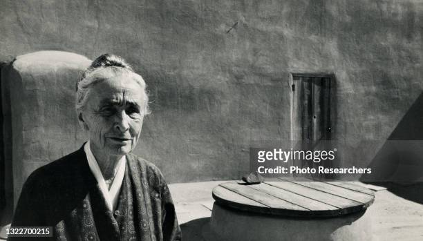 Portrait of American artist Georgia O'Keeffe as she poses on the patio of her home, Abiquiu, New Mexico, 1971.