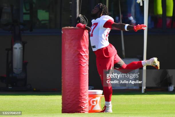 Ronald Jones of the Tampa Bay Buccaneers stretches during the Buccaneers Mini-Camp at AdventHealth Training Center on June 09, 2021 in Tampa, Florida.