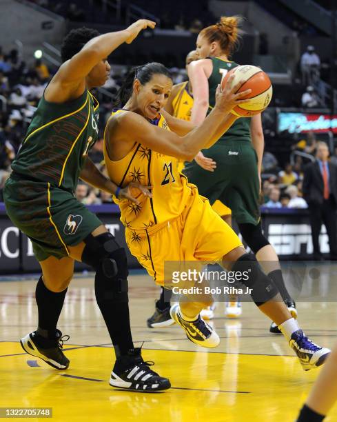 Seattle Storm guard Ticha Penicheiro drives for the basket during 2nd half action, August 28, 2010 in Los Angeles, California. The Storm won the game...
