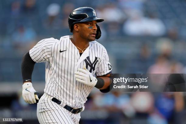 Miguel Andujar of the New York Yankees runs to first during the fifth inning of Game One of a doubleheader against the Toronto Blue Jays at Yankee...