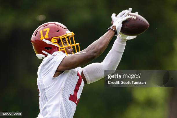 Terry McLaurin of the Washington Football Team catches a pass during mandatory minicamp at Inova Sports Performance Center on June 9, 2021 in...