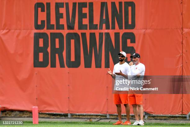 General manager Andrew Berry and head coach Kevin Stefanski of the Cleveland Browns watch practice during an OTA at the Cleveland Browns training...