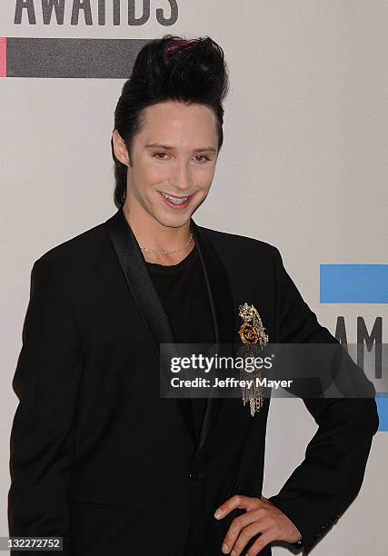 Johnny Weir poses in the press room during the 2010 American Music Awards held at Nokia Theatre L.A. Live on November 21, 2010 in Los Angeles,...