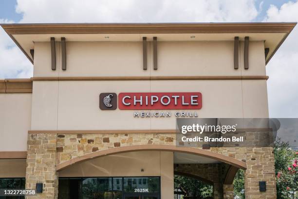 The exterior of a Chipotle Mexican Grill store is shown on June 09, 2021 in Houston, Texas. Menu prices at Chipotle Mexican Grill have risen by...