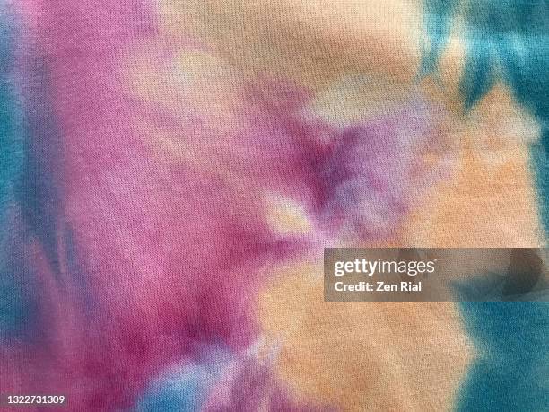 multi colored tie dyed cotton fabric from spring summer collection - high contrast background stock pictures, royalty-free photos & images