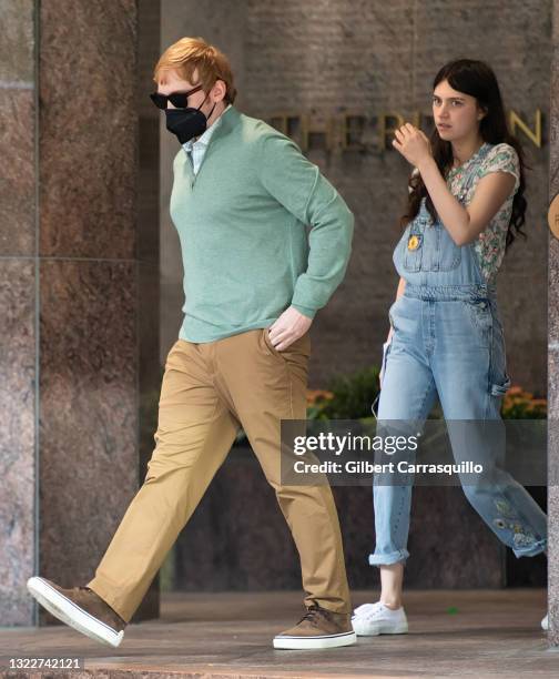 Actors Rupert Grint and Nell Tiger Free are seen walking to the set of Apple TV+ streaming television series "Servant" Season 3 on June 09, 2021 in...