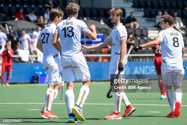 Antoine Kina celebrates with Tom Boon and Nicolas de Kerpel of Belgium after scoring his sides fifth goal during the Euro Hockey Championships match...