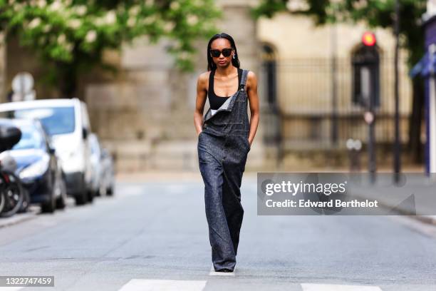 Emilie Joseph @in_fashionwetrust @in_fashionwetrust wears black vintage sunglasses, silver and crystal Swarovski Collection I by Giovanna Engelbert...