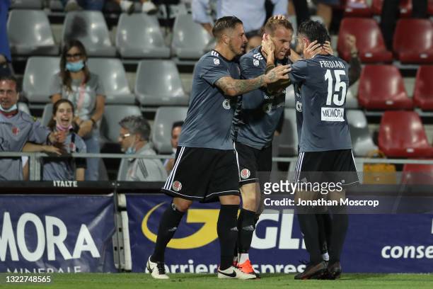 Francesco Stanco of US Alessandria celebrates with team mates Umberto Eusepi and Marco Frediani after scoring to level the game at 2-2 during the...
