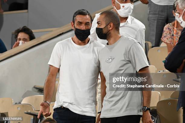 Robert Pires and Tony Parker attend the French Open 2021 at Roland Garros on June 09, 2021 in Paris, France.