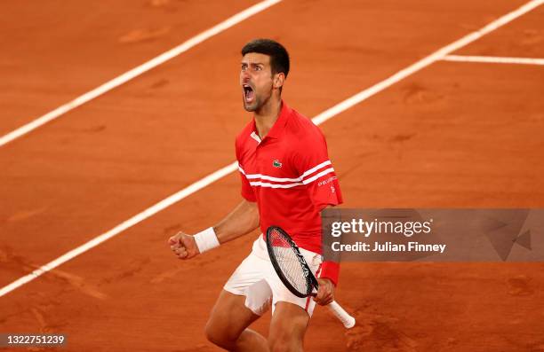 Novak Djokovic of Serbia celebrates match point and victory during his Mens Singles Quarter-Final match against Matteo Berrettini of Italy during Day...