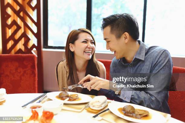 couple dining together - asian couple dining stockfoto's en -beelden