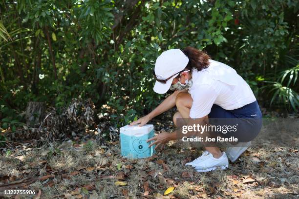 Meredith Fensom, Oxitec's head of global public affairs, shows off a box from where genetically engineered Aedes aegypti mosquitoes are released on...