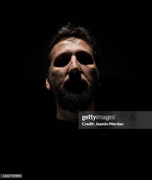 adult man in dark - black white business poeple portraits dark stock-fotos und bilder