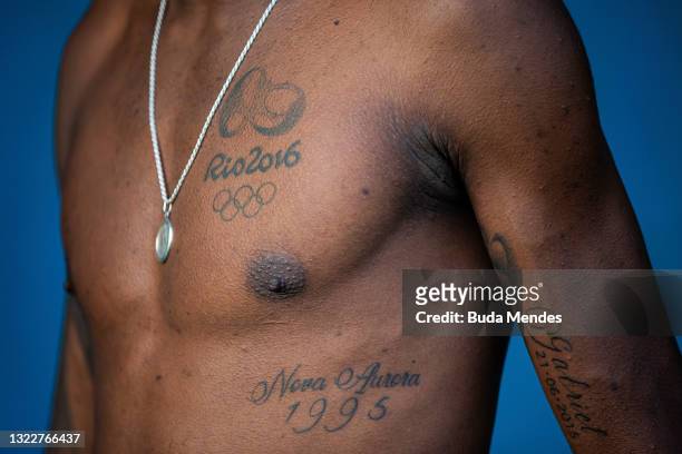 Brazilian track and field athlete Thiago do Rosario Andre poses for a photo after a training session ahead of Tokyo Olympic Games at Centro Olimpico...