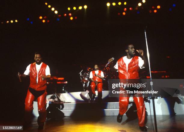 Shawn Stockman, Wanya Morris, and Nathan Morris of Boyz II Men perform at Shoreline Amphitheatre on May 27, 1998 in Mountain View, California.