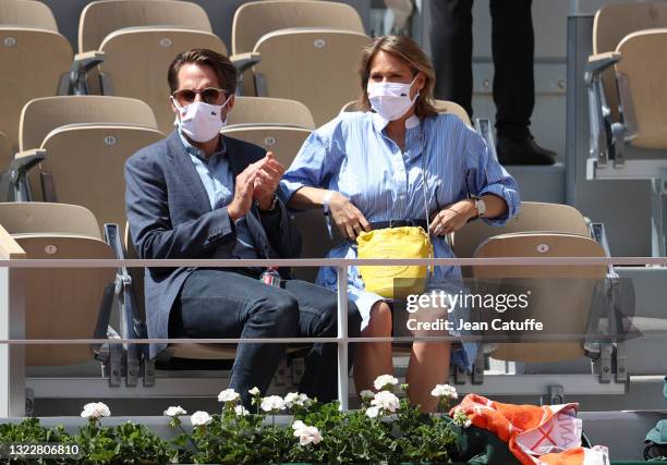 Pregnant Ophelie Meunier and husband Mathieu Vergne attend day 11 of the 2021 Roland-Garros, French Open, a Grand Slam tennis tournament at...