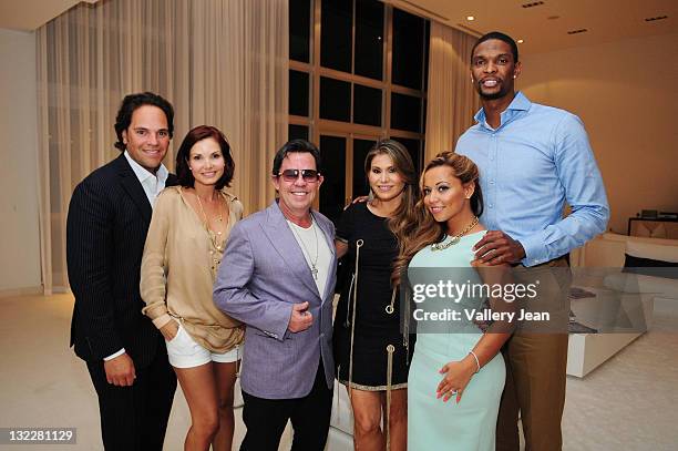 Michael Piazza, Alicia Piazza, JR Ridinger, LorenRidinger, Adrienne Williams and Chris Bosh attend the Haute Living and Dom Perignon kick off of the...