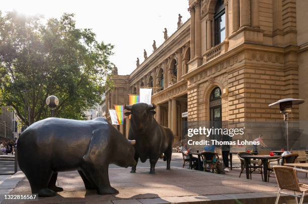 Bull and bear sculpture stand in front of the Frankfurt Stock Exchange on June 09, 2021 in Frankfurt, Germany. While the German economy is showing...