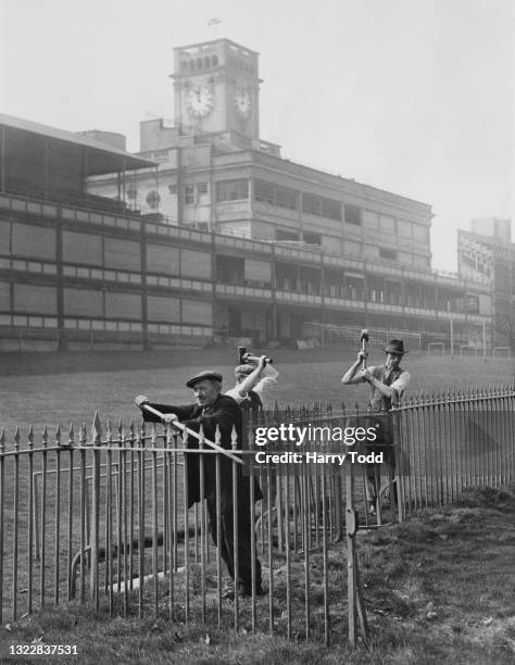 Workers begin to dismantle the spectator railings near the main grandstand of the Royal Ascot racecourse to reclaim the steel and iron as part of the...