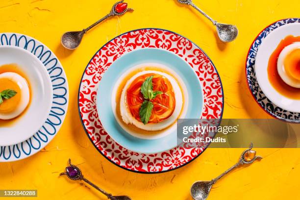 cream caramel on colorful background - flan stock pictures, royalty-free photos & images