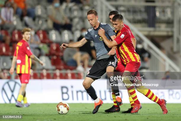 Simone Canestrelli of UC Albinoleffe tussles with Francesco Stanco of US Alessandria during the Serie C play-off match between US Alessandria and UC...