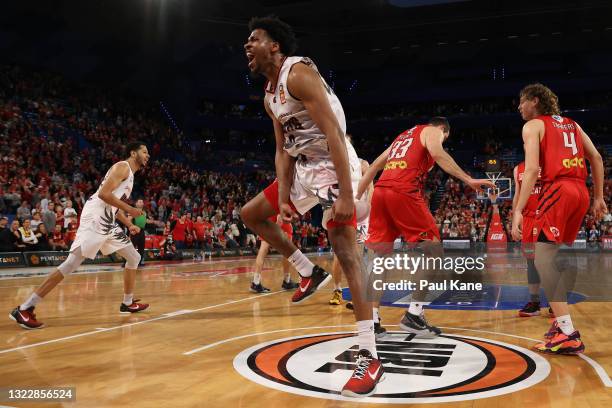 Justin Simon of the Hawks celebrates a basket late in the final quarter during game one of the NBL Semi-Final Series between the Perth Wildcats and...