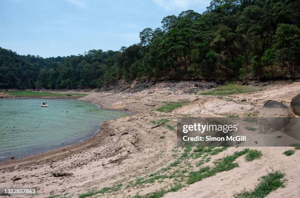 low water level due to drought on lake avándaro, valle de bravo, mexico - mexico state stock pictures, royalty-free photos & images