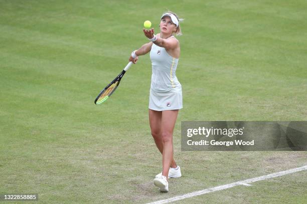 Kateryna Kozlova of Ukraine serves against Johanna Konta of Great Britain during the women's singles match on day six of the Viking Open at...