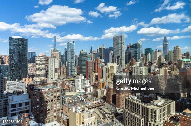 high angle skyline view of midtown manhattan - new york - new york times building stock pictures, royalty-free photos & images