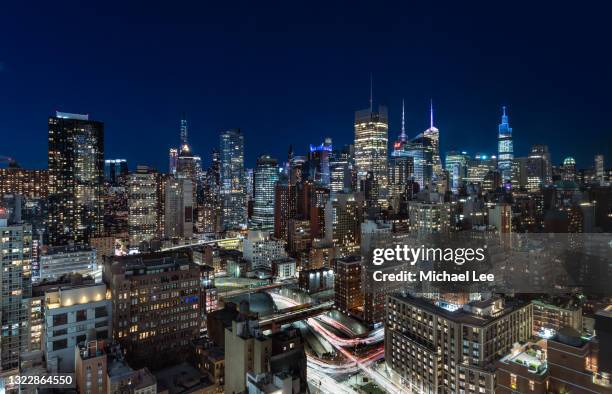 high angle skyline view of midtown manhattan - new york - new york times building stock pictures, royalty-free photos & images