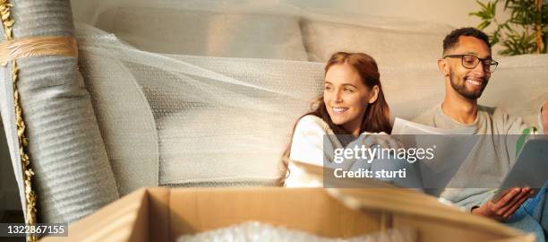 happy in the new home - sitting on floor stock pictures, royalty-free photos & images