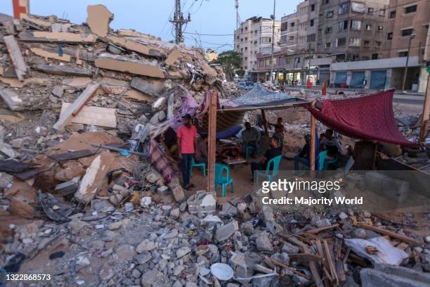 Palestinian family lives in a tent on the rubble of their destroyed home in the northern Gaza Strip. Gaza City.