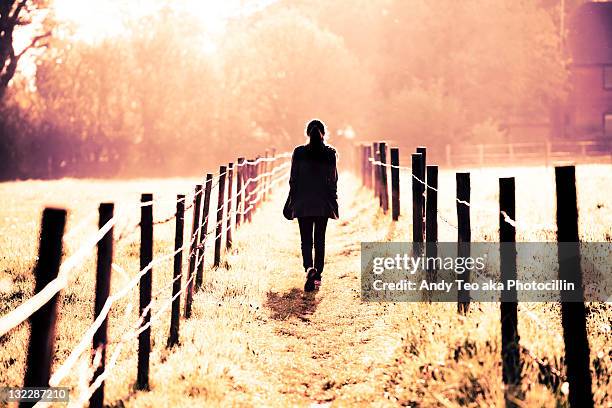 teenage girl walking - only teenage girls stock pictures, royalty-free photos & images