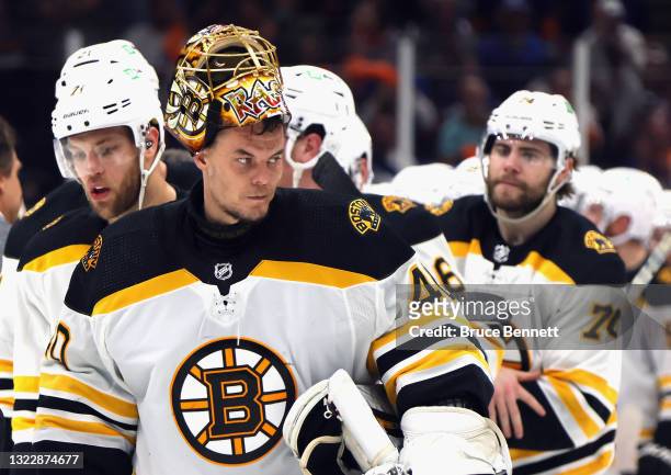 Tuukka Rask of the Boston Bruins leaves the ice following shaking hand with the New York Islanders after Game Six of the Second Round of the 2021 NHL...