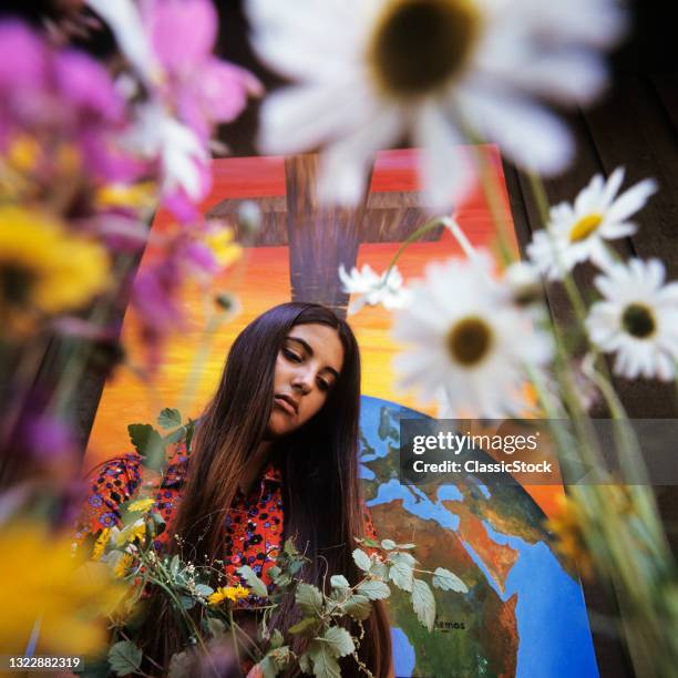 1960s 1970s Hippie Introspective Brunette Girl Daisies And Christian Cross Crucifix.