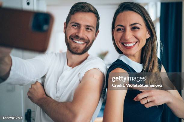 vaccine selfie. - two shot stock pictures, royalty-free photos & images