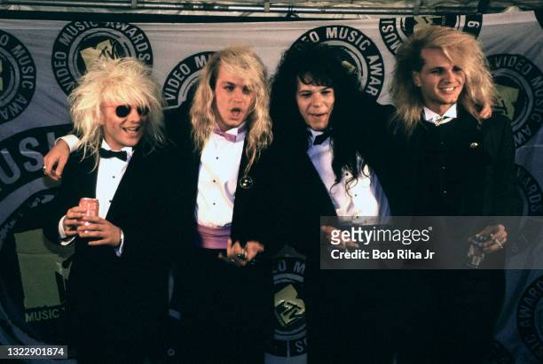 Members of Poison: C.C. Deville, Brett Michaels, Bobby Dall and Rikki Rockett backstage at the Mtv Awards Show, September 13, 1987 in Los...