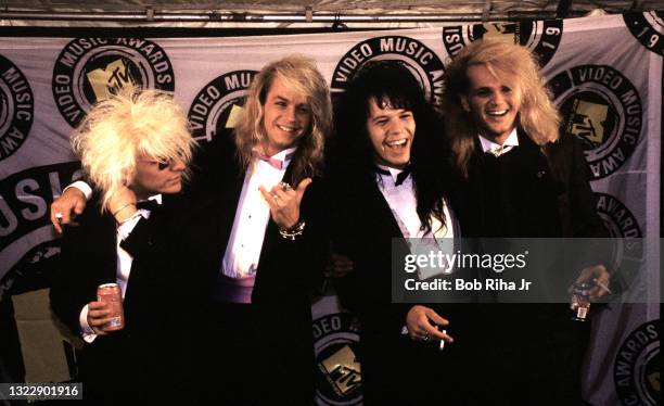 Members of Poison: C.C. Deville, Brett Michaels, Bobby Dall and Rikki Rockett backstage at the Mtv Awards Show, September 13, 1987 in Los...