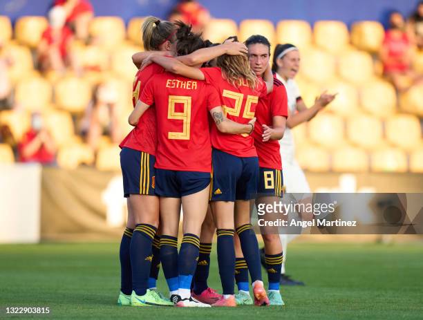Alexia Putellas of Spain celebrates with team mates after scoring their side's second goal from penalty spot during the Women's International...