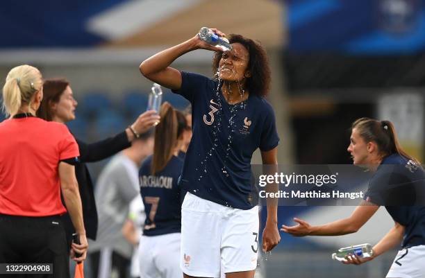 Wendie Renard of France hydrates during the Women's International Friendly match between France and Germany at La Meinau Stadium on June 10, 2021 in...